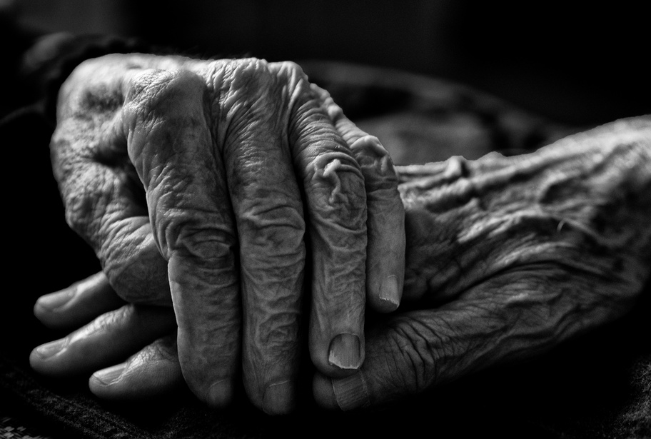 Grayscale Photo of an Elderly Person's Hands